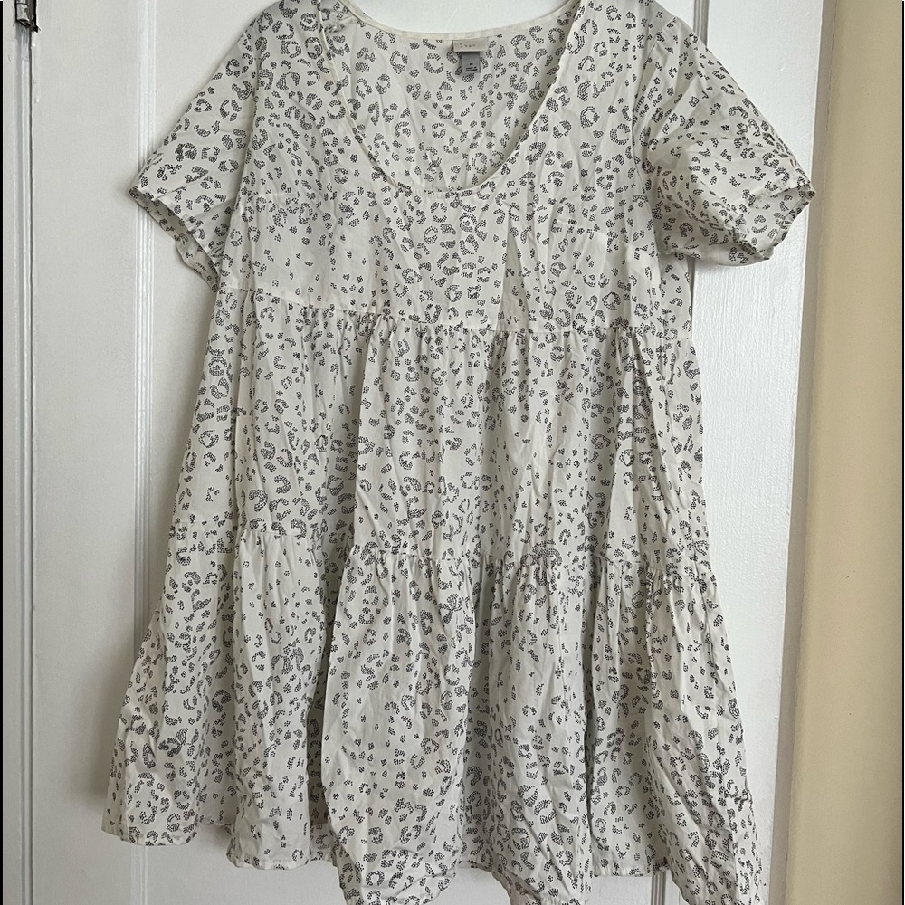 Pattern mini dress with sleeves and pockets